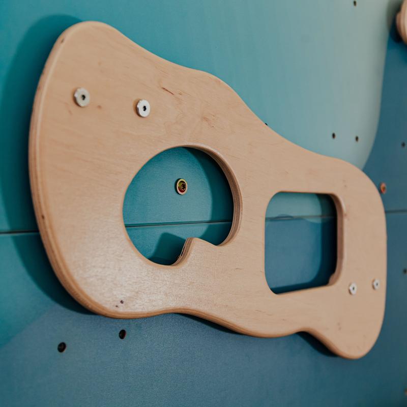 Children's Home Gym – close-up of shaped wooden hold on Alaska panel