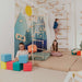 Children's Home Gym – kids playing beside Alaska wall with optional foam cubes