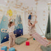 Children's Home Gym – kid on rope swing with others nearby