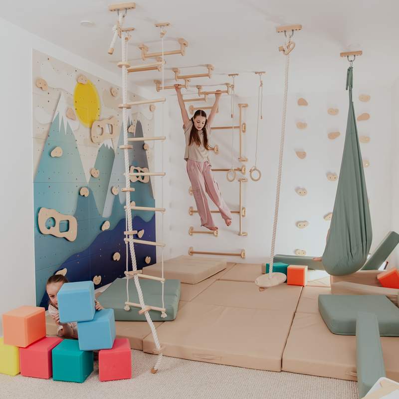 Children's Home Gym – kid climbing a rope ladder in the Alaska playroom