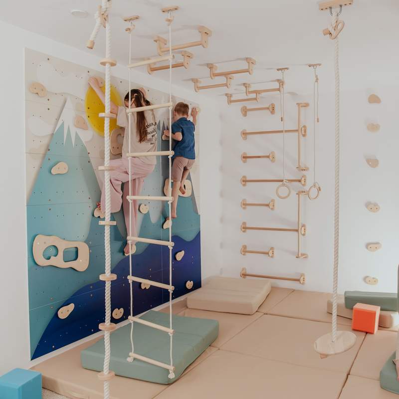 Children's Home Gym – kid reaching overhead from the rope ladder