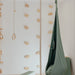 Climbing Holds – wall hold layout beside an optional pod swing