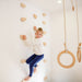 Climbing Holds – kid climbing holds beside gymnastic rings