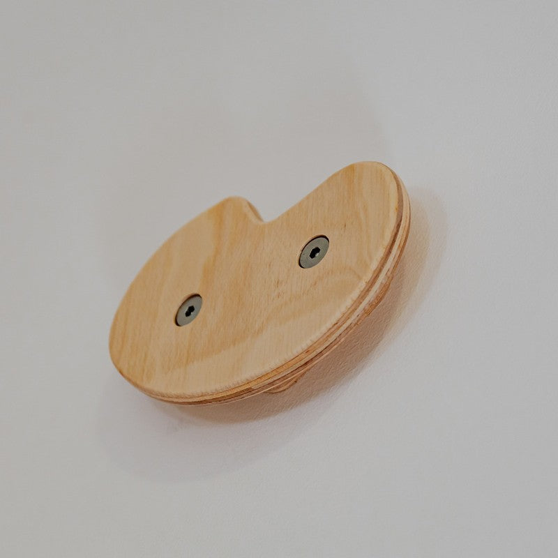 Climbing Holds – close-up of an elongated wooden climbing hold