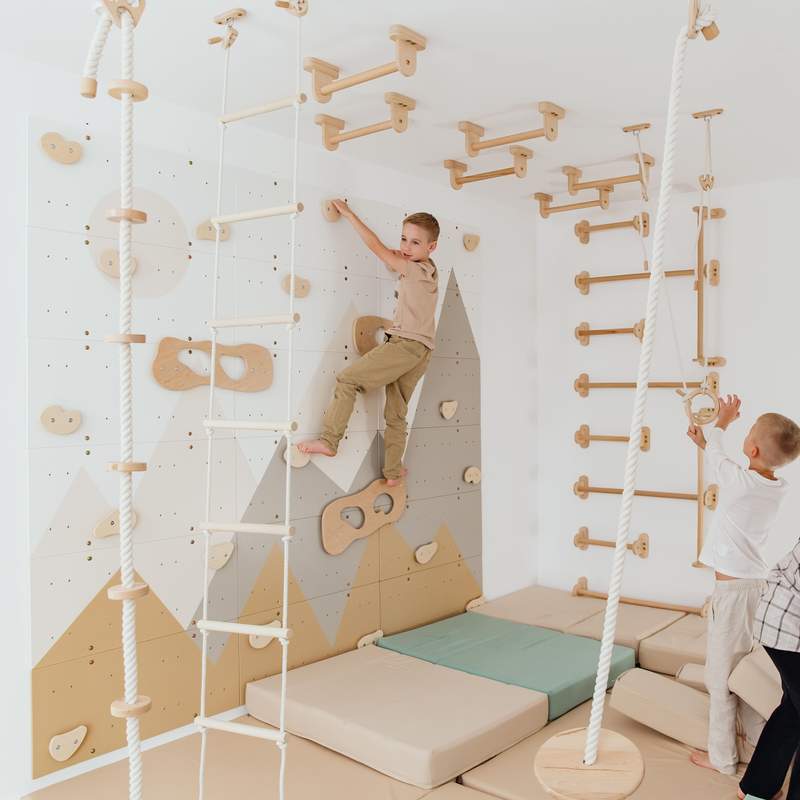 Wood and Hearts Climbing Wall Playground – kid climbing the mountain wall