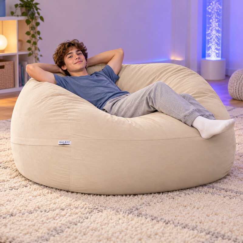 Cloud Comfort Bean Bag (Double) – teen reclining on the Tan matte velvet bean bag in a sensory room