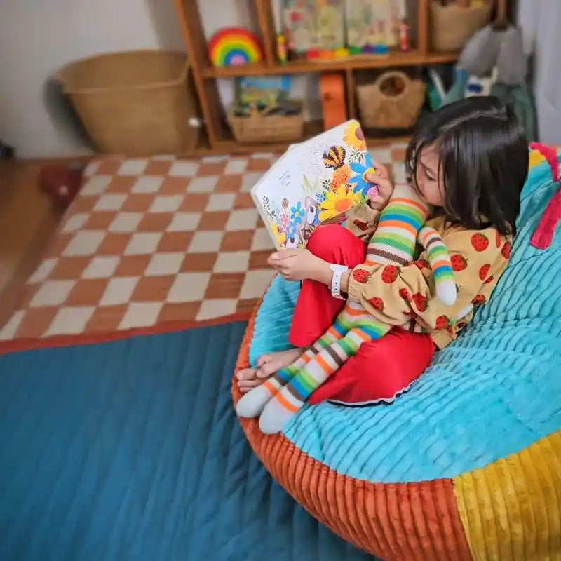 CordaRoy's Bambino Kids Chair – child using Rainbow Bambino chair