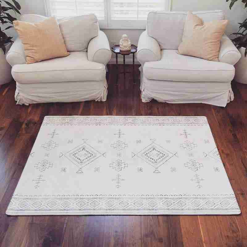 Dakota Ivory Shwally Playmat displayed on a wooden nursery floor