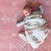 Baby resting comfortably on the Dakota Rose Shwally Playmat