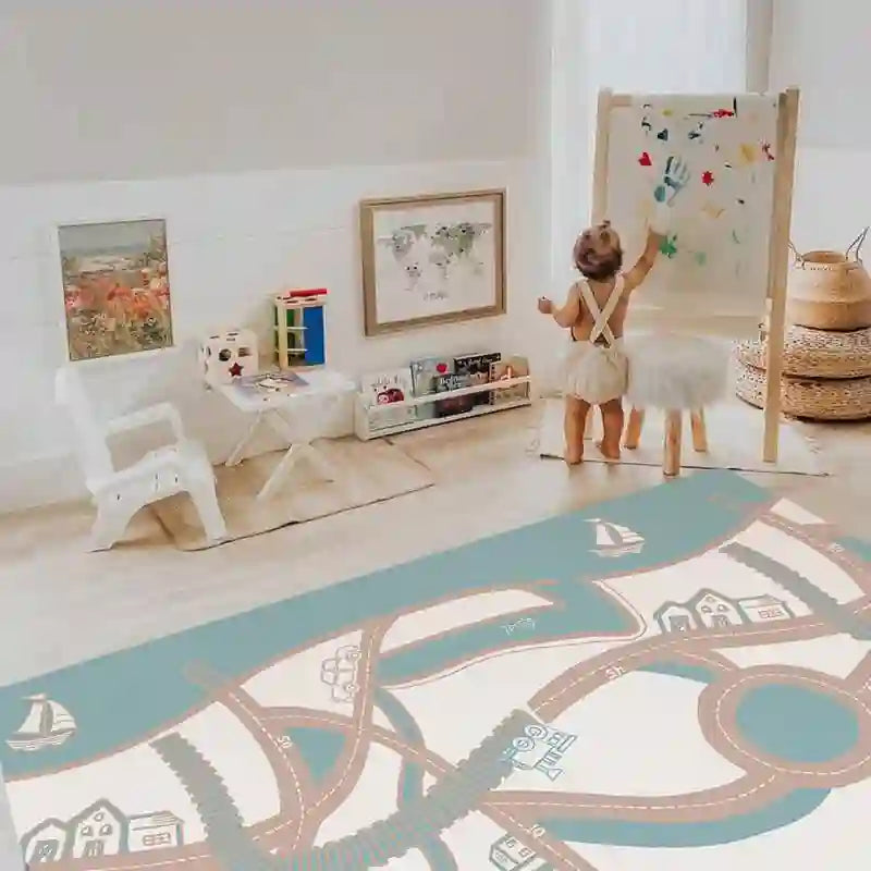 Reverse side of the Dakota Rose Shwally Playmat with playful illustrated road design
