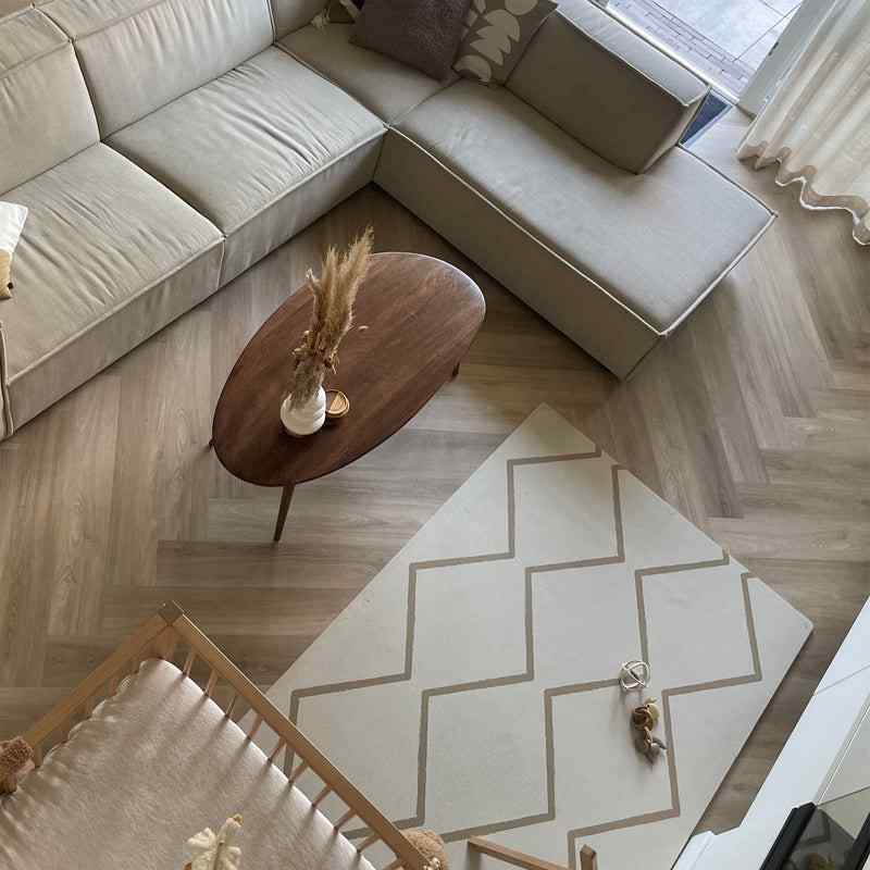 eeveve beni autumn gold double sided playmat in a living room