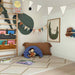 eeveve beni autumn gold double sided playmat in a playroom