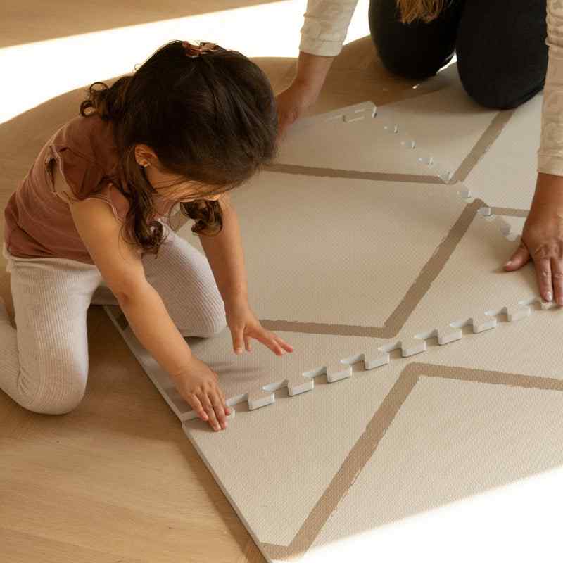 
Eeveve beni autumn gold double sided playmat with a boy playing 