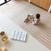 eeveve lucio desert sand double sided playmant with a baby