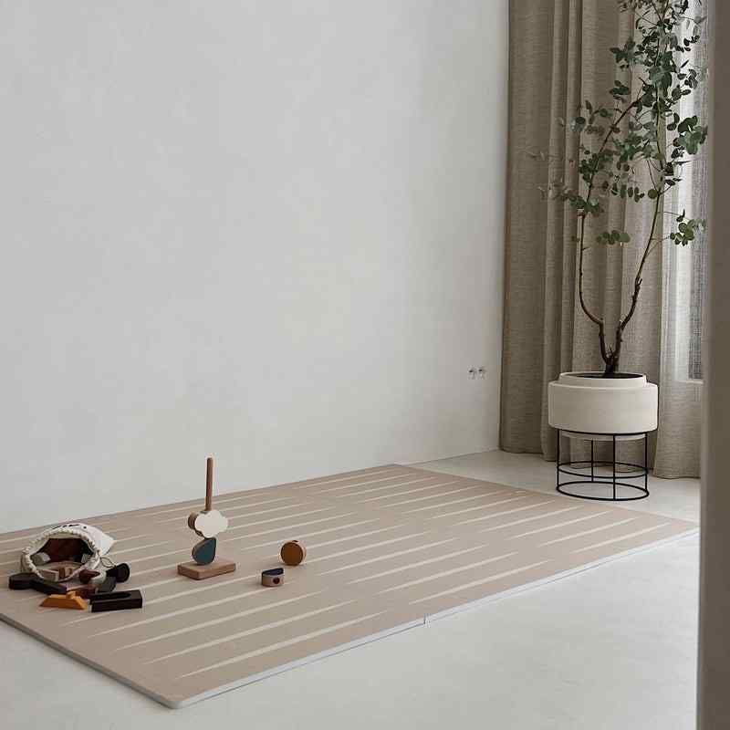 eeveve lucio desert sand double sided playmat in a playroom