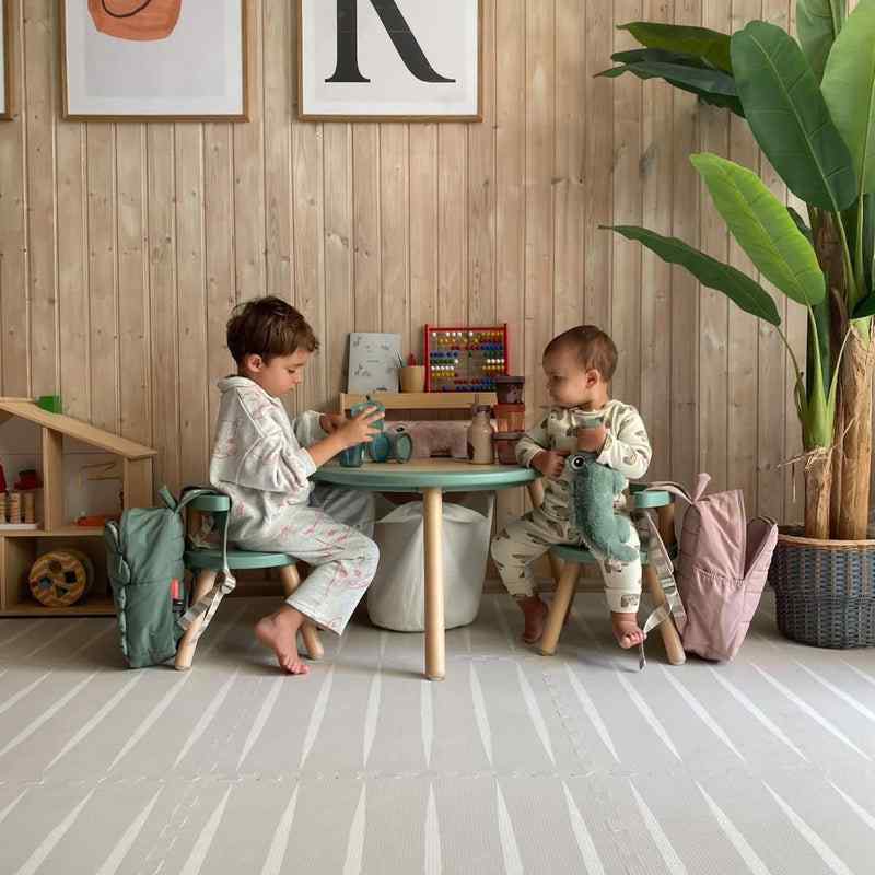 eeveve lucio linen double sided play mat with kids playing 