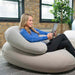 Crescent Backrest – adult using Space Gray backrest with a separately sold seat