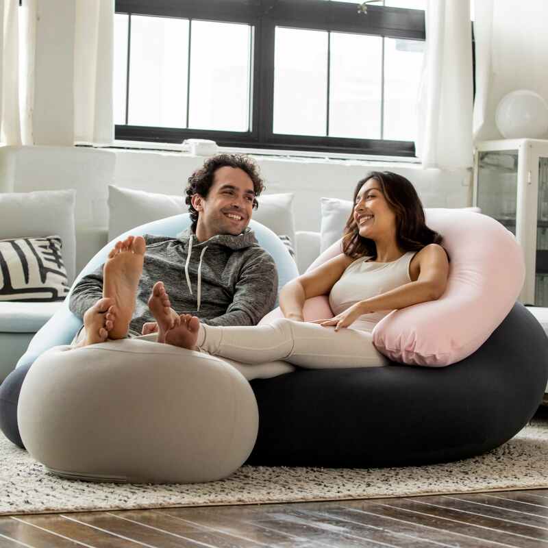 Crescent Backrest – couple using backrests with separately sold Double Moon Pod and footrest
