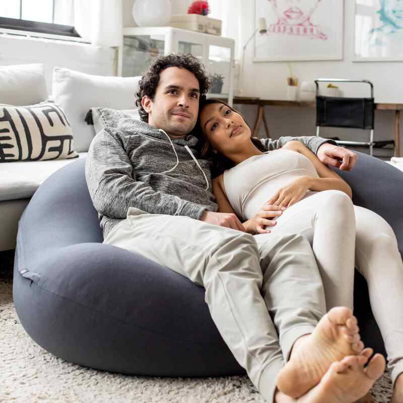 Double Moon Pod – couple sitting together on the lounge seat at home