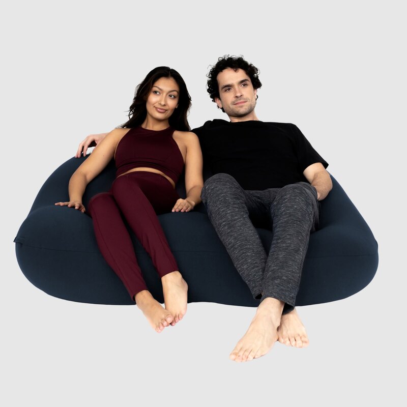 Double Moon Pod – two adults sharing the Moon Indigo lounge seat