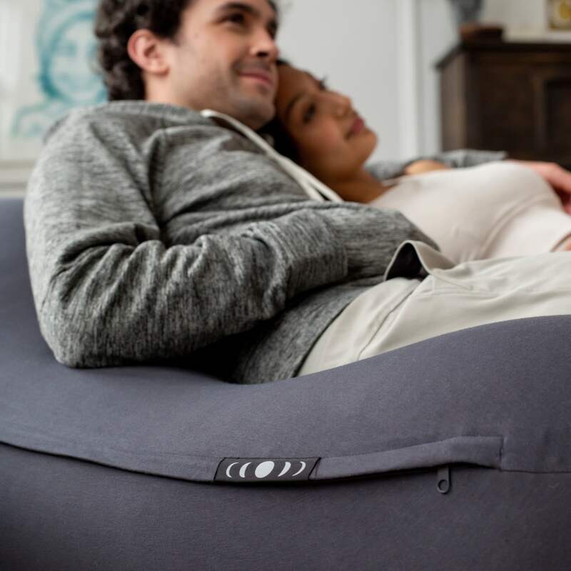 Double Moon Pod – close view of a couple reclining on the Cosmic Ash seat