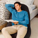 Moon Pod Bundle (Moon Pod + Backrest + Footrest) – Cosmic Ash seat used for reading beside a bed