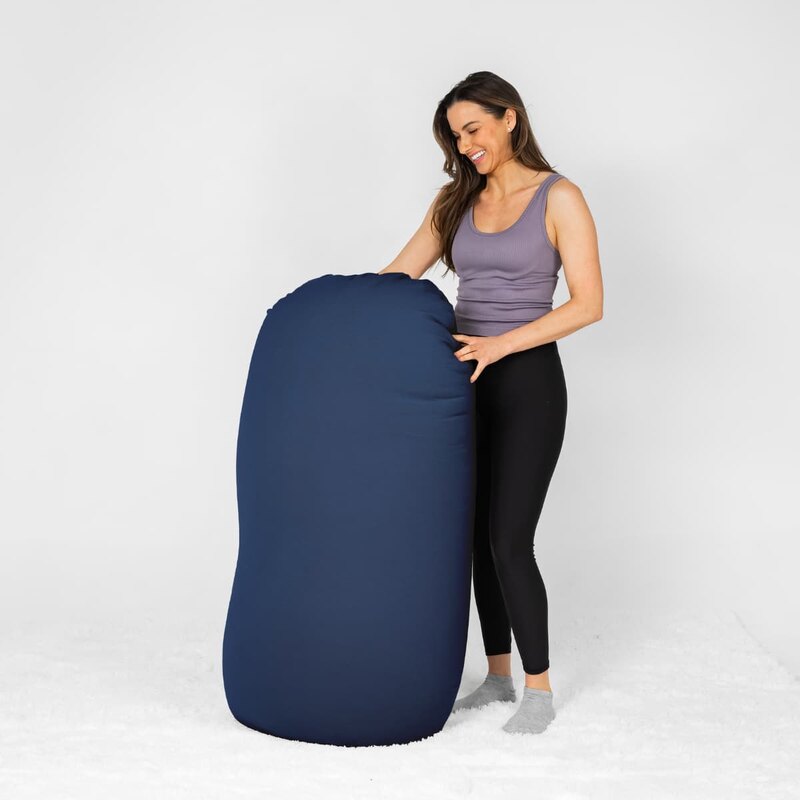 Moon Pod Bundle (Moon Pod + Backrest + Footrest) – adult holding the Moon Indigo seat upright