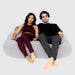 Double Moon Pod – two adults sharing the Space Gray lounge seat