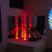 Children using the Experia Interactive LED Bubble Tube Corner glowing red