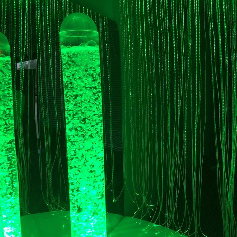 Close-up of Experia Sensory Cocoon with green illuminated bubble tube