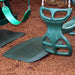 Playground fanny pad in green on mulch