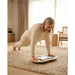 Flexyboard™ – adult using the board for a floor exercise