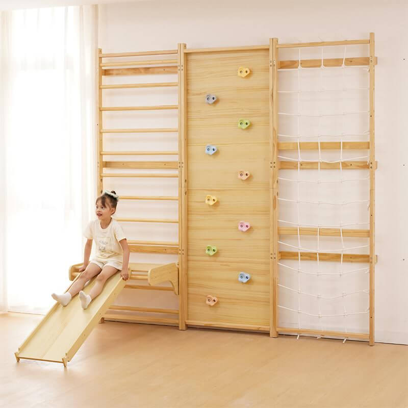 Avenlur 9-in-1 Montessori Inspired Gym Set with girl happily smiling while sliding