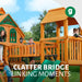 Gorilla Playsets Everest Elite Swing Set – children crossing the bridge between the covered play decks