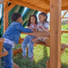 Gorilla Playsets Summerville Deluxe Swing Set – children playing at the built-in picnic table