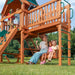 Gorilla Playsets Summerville Swing Set – family using the bench swing and upper clubhouse