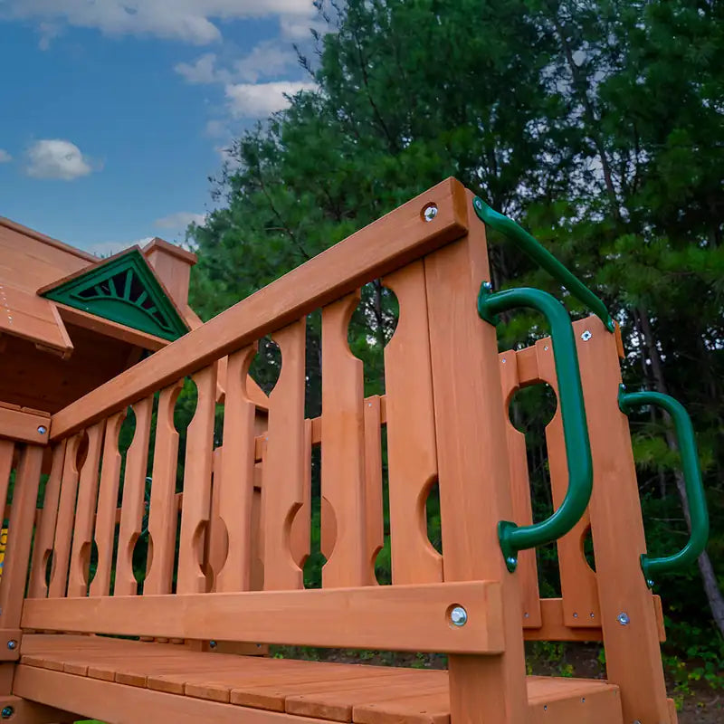Gorilla Playsets Summerville Swing Set – wooden deck railing and green safety handles