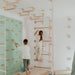 Home Monkey Bars – kids climbing a wall-mounted bar route