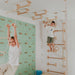 Home Monkey Bars – kids using long wall bars and overhead equipment