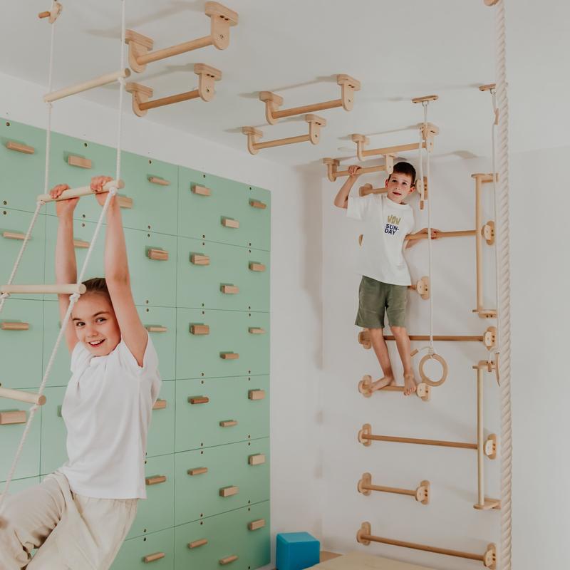 Home Monkey Bars – kids using long wall bars and overhead equipment