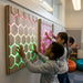 Honeycomb Touch Interactive Panel - children exploring illuminated hexagon patterns