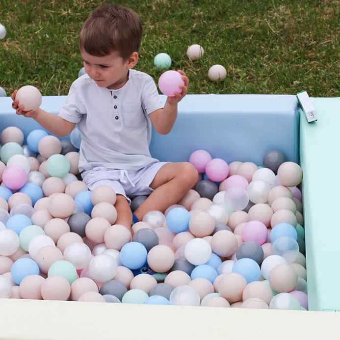 iglu soft play with boy outside