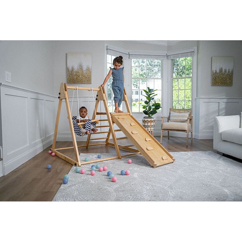 juniper_real_wood_folding_playset_indoor_girl_playing_slide