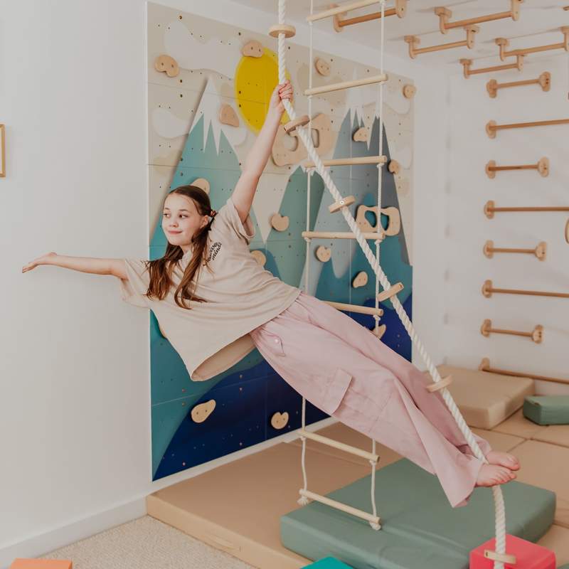 Kids Climbing Ropes – kid swinging on the round rope seat