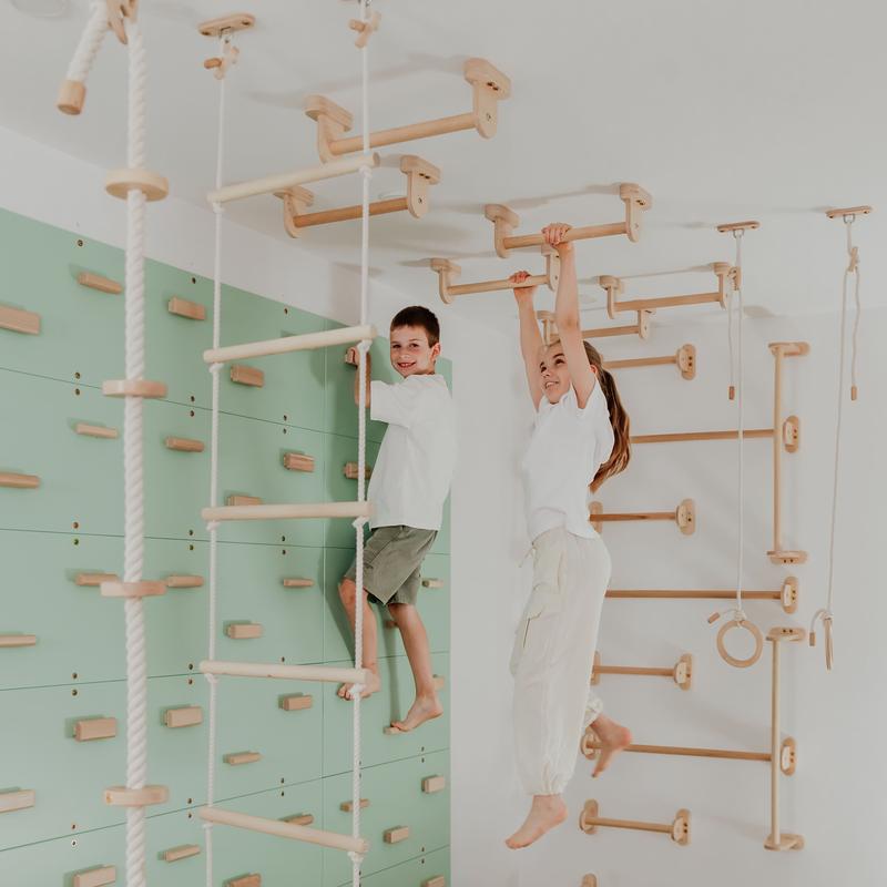 Kids Climbing Ropes – kids using rope activities in a Cool Mint playroom