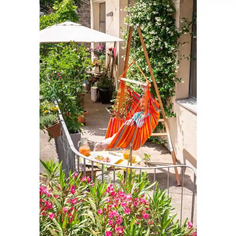 Domingo Toucan - Weather-Resistant Basic Hammock Chair – chair on a balcony with a separate stand