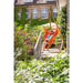 Domingo Toucan - Weather-Resistant Basic Hammock Chair – person relaxing beside balcony greenery