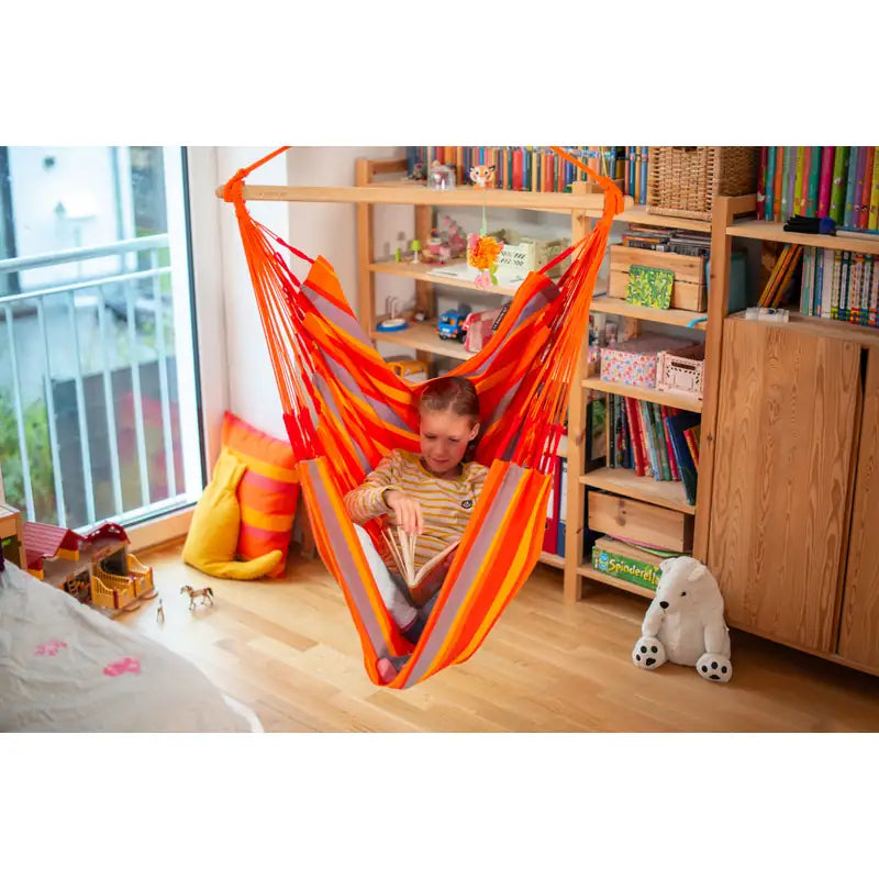 Domingo Toucan - Weather-Resistant Basic Hammock Chair – person seated in a bedroom reading corner