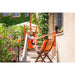 Domingo Toucan - Weather-Resistant Basic Hammock Chair – seated user on a balcony
