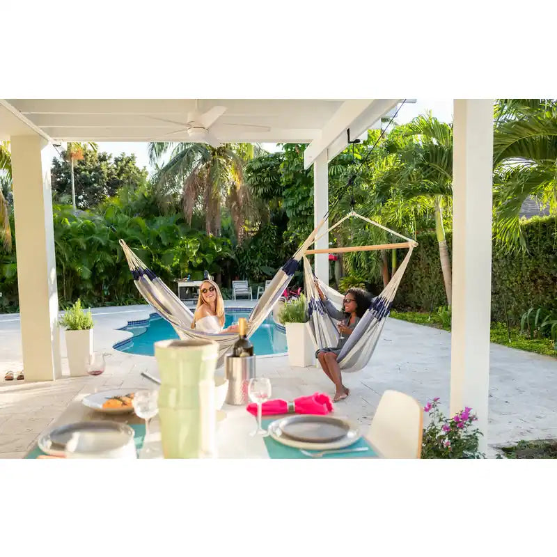 Domingo Sea Salt - Weather-Resistant Comfort Hammock Chair – family seated beneath a covered patio